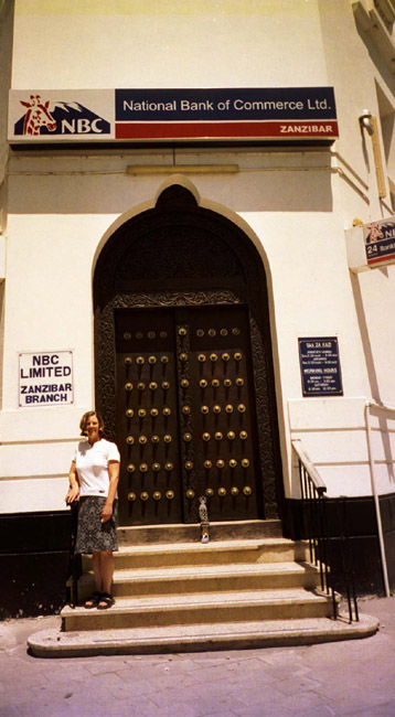 Laura, posing in front of some of the doors covered in spikes to prevent elephant attacks